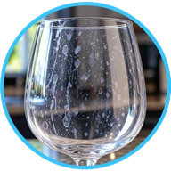 Spotted, filmy glassware caused by hard water